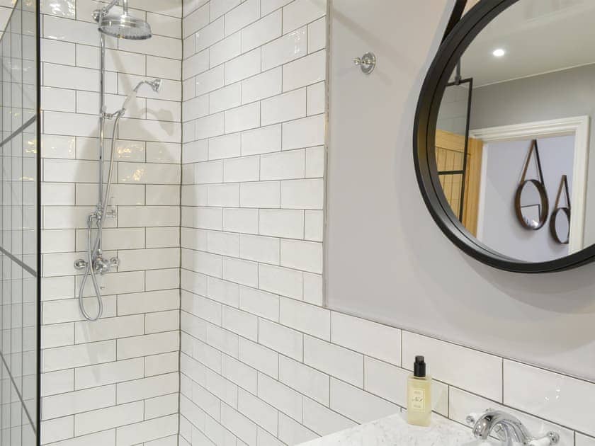 Bathroom with freestanding roll-top bath | Jubilee House, Alnwick