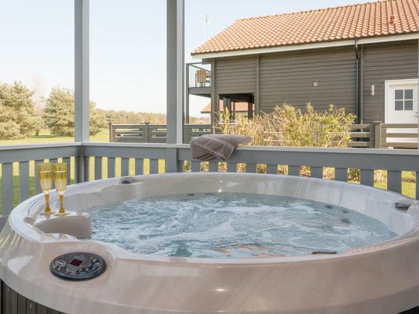 Luxurious hot tub on covered deck | Broad Reach, Fritton, near Great Yarmouth