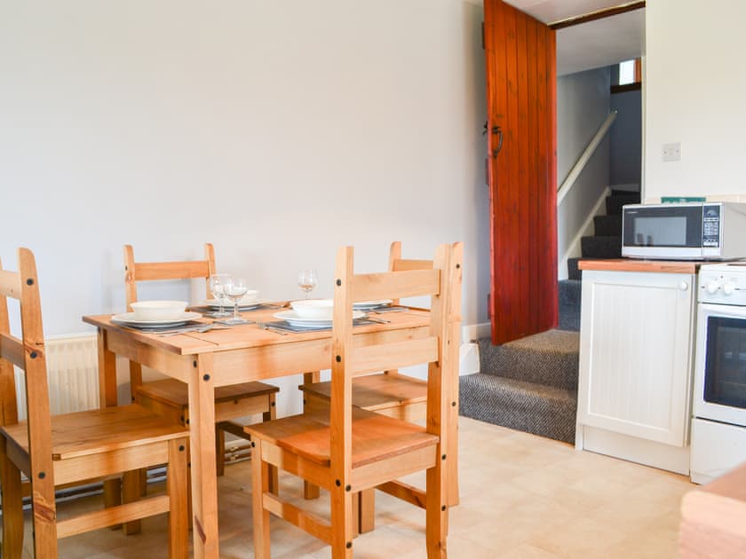 Delightful dining area and adjacent kitchen | Granary Cottage - Common House Farm, Melkridge