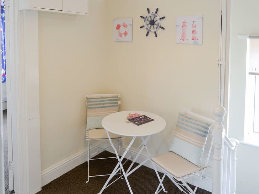 Seating area on landing | Coastguard Cottage, Caister-on-Sea, near Great Yarmouth