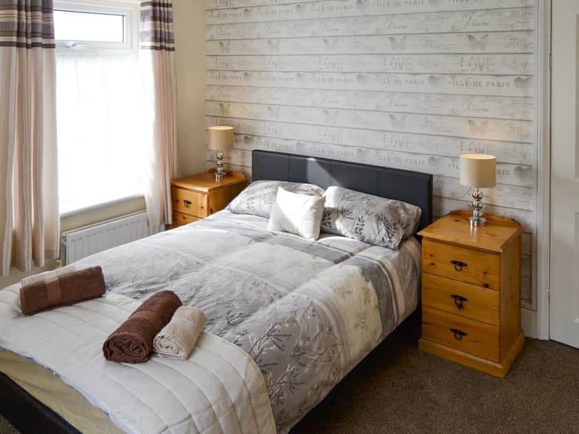 Relaxing double bedroom | Coastguard Cottage, Caister-on-Sea, near Great Yarmouth