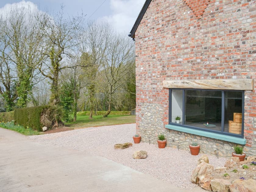 Charming stone-built barn, lovingly converted to a holiday home | The Wheel House, East Hill, near Ottery St Mary