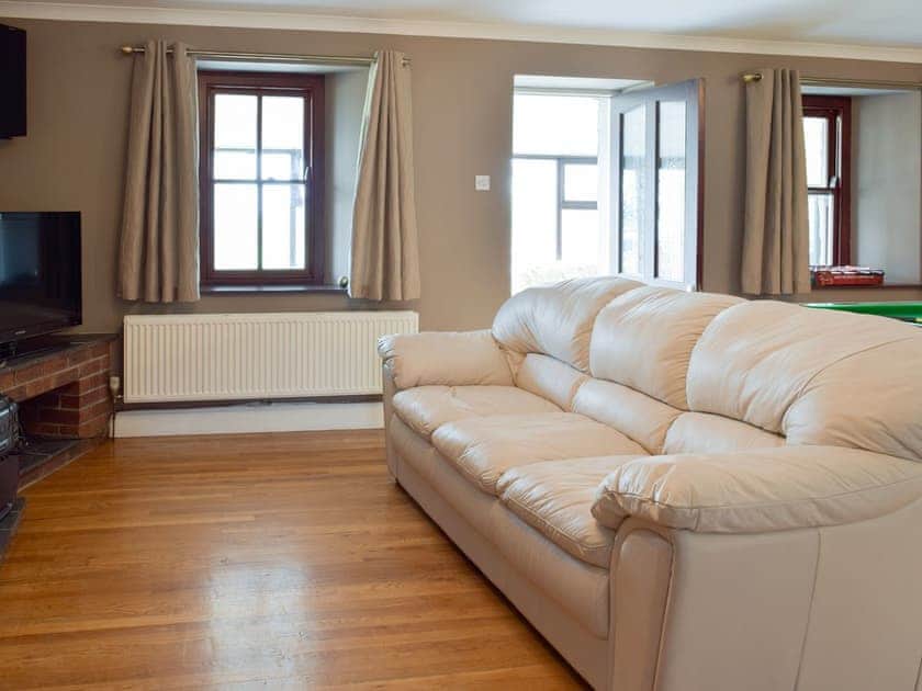Seating area within games room | Brynhowell - Brynhowell Barns, Glandwr, near Narbeth