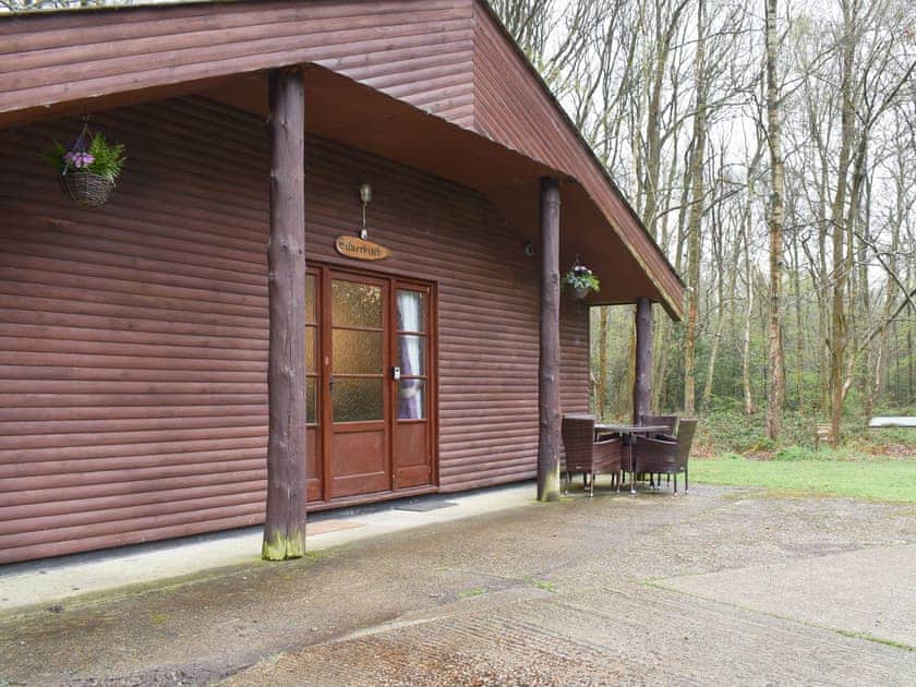 Patio area with outdoor furniture | Silver Birch Lodge - Eversleigh Woodland Lodges, Shadoxhurst, near Ashford