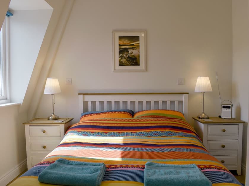 Comfortable double bedroom | Sandcastles, Swanage