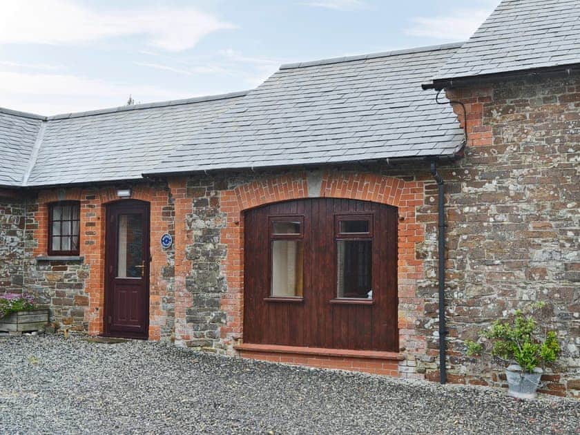 Front entrance from the gravelled courtyard | Warren Cottage - Stowford Lodge Holiday Cottages, Langtree, near Great Torrington
