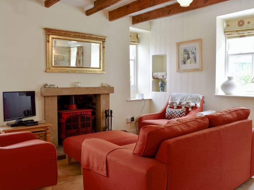 Comfortable living area with wood burner | Felicity House, Staithes, near Whitby