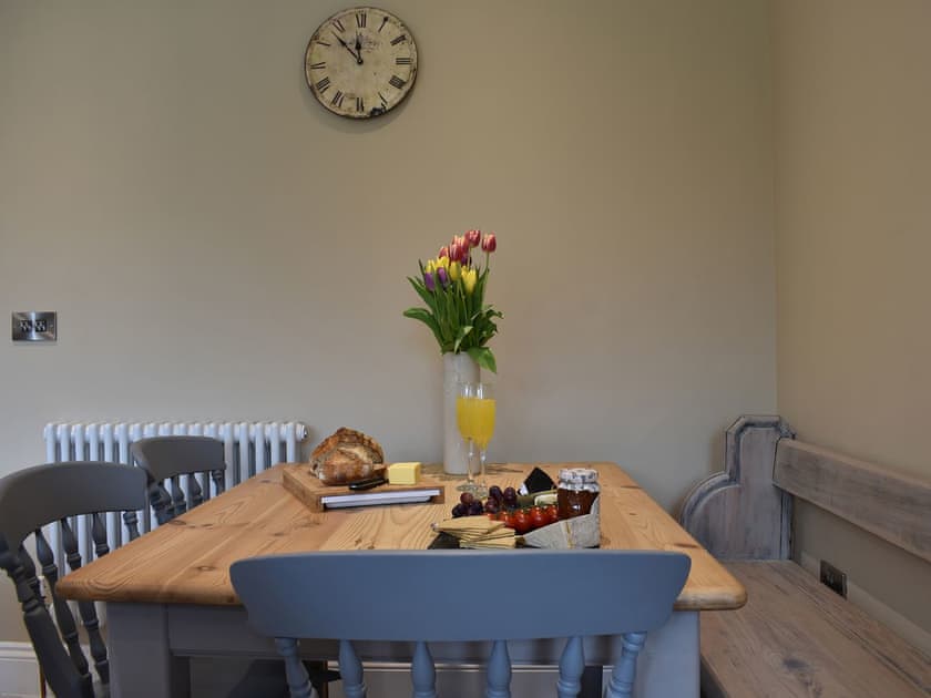 Dining table with bench seating | Burton House - Reeth Holiday Cottages, Reeth, near Richmond