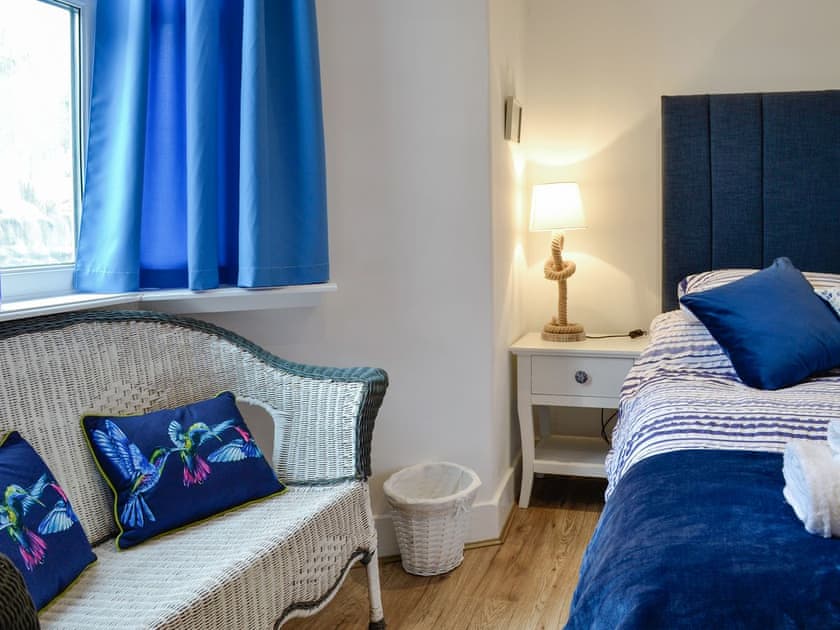 Seating area within the double bedroom | Brig-y-Don Bach - Brig-y-Don, Llanaber, near Barmouth