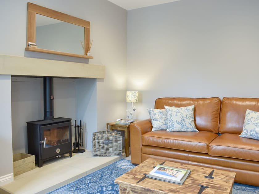 Wood burner within living room | Greystones - Reeth Holiday Cottages, Reeth, near Richmond