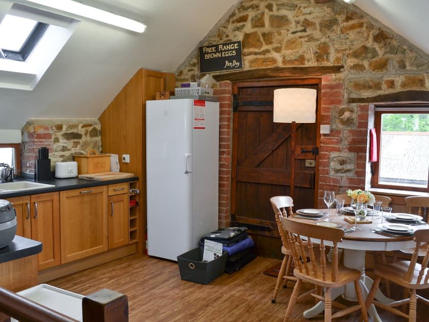 Kitchen and dining area | The Old Coach House - Cranford and The Coach House Cottages, Cranford, near Clovelly