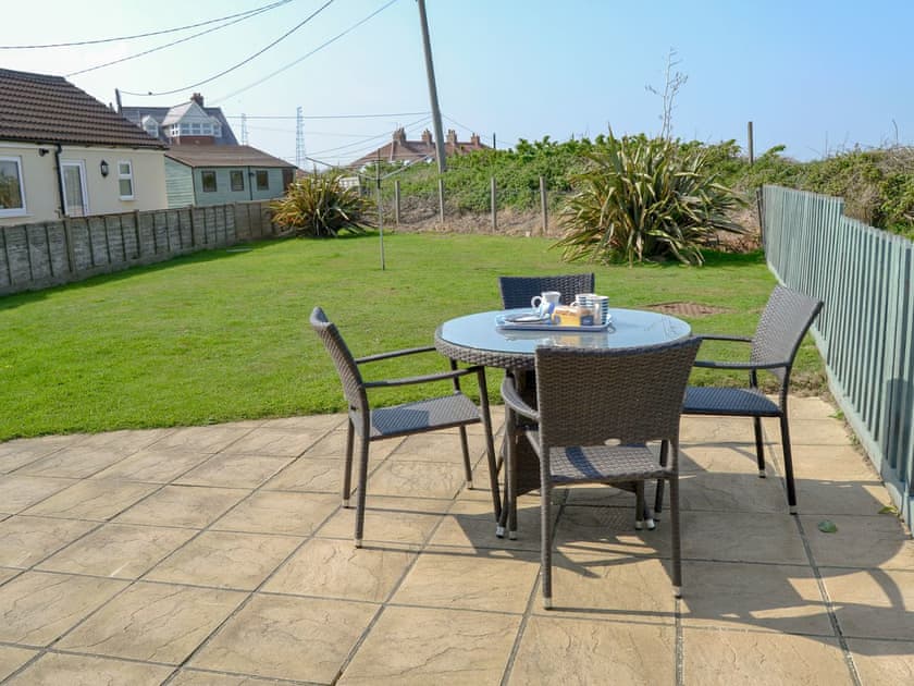 Patio area | Cottage By The Sea, Bacton, near North Walsham