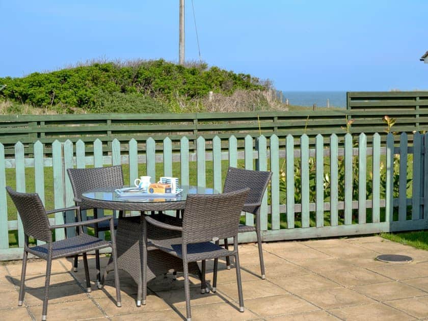 Relaxing sitting out area | Cottage By The Sea, Bacton, near North Walsham