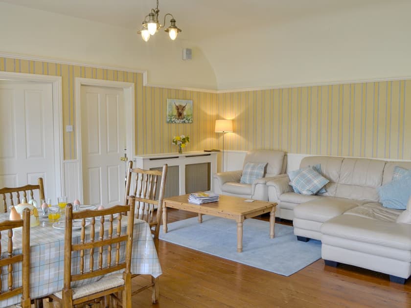 Comfortable living area | Kinnelhook Holiday Cottage, Lochmaben, near Lockerbie