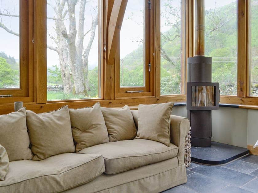 Seating area within conservatory | Dol Y Clochydd, Llanfachreth, near Dolgellau