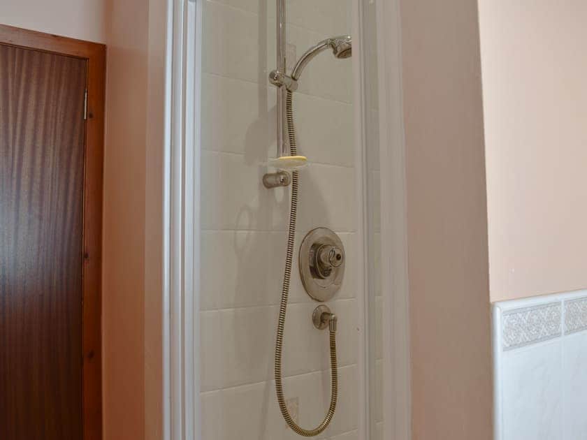 Bathroom with bath and shower cubicle | Seashore Retreat, Johnshaven, near Montrose