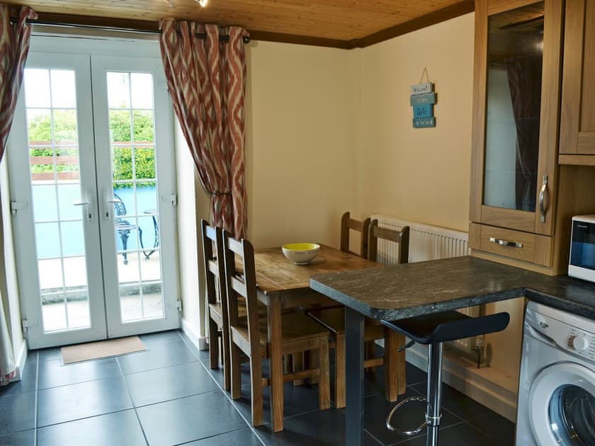 Inviting dining area | Old Mill Cottage, Cemaes Bay
