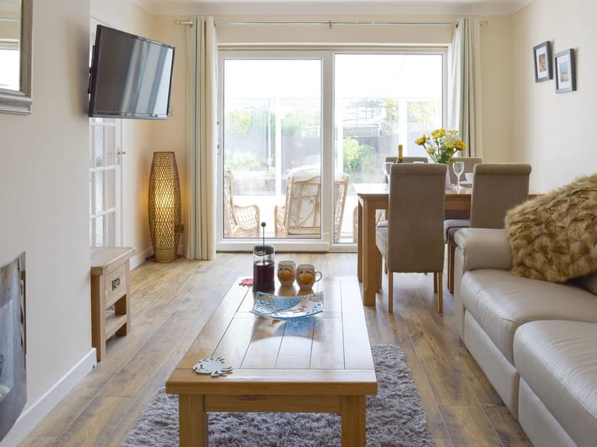 Welcoming living and dining room | Sea Dreams - Sandy Hill Park, Saundersfoot