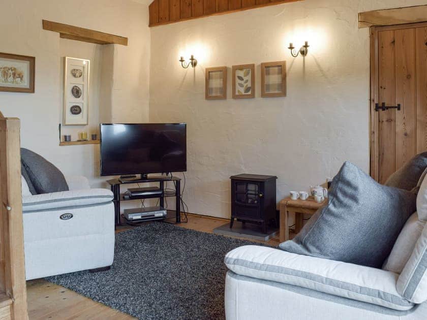 Welcoming living room | Hayloft Cottage - Croft Farm Cottages, Ludchurch, near Narberth