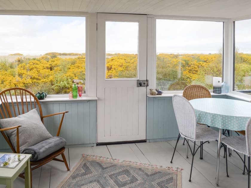 Spacious sunroom | Wester Lonemore, Lonemore, near Dornoch