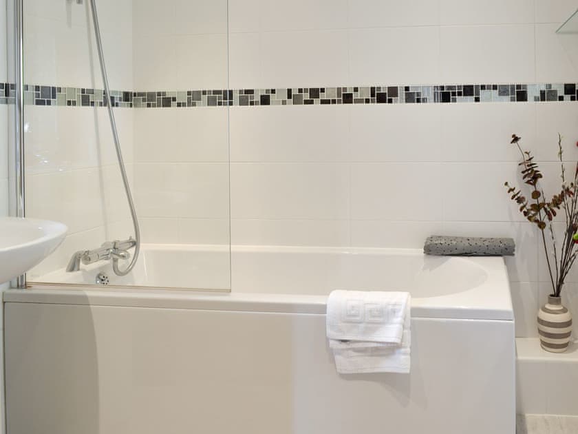 Bathroom with shower over bath | Newstead Cottage, Thornton-le-Dale, near Pickering