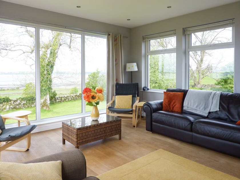 Spacious sunroom | Kirkbride Farmhouse, Carsluith, near Newton Stewart