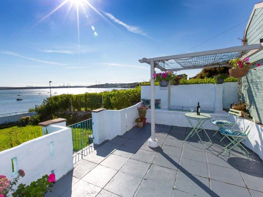 Sunny patio overlooking the estuary | Eventide, Neyland, near Pembroke