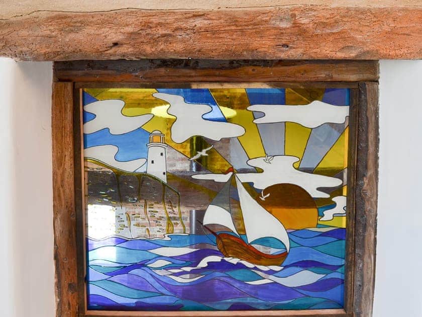 Unique stained glass window in the bedroom | Christine Cottage - Freya Cottage & Christine Cottage - Christine Cottage, Flamborough