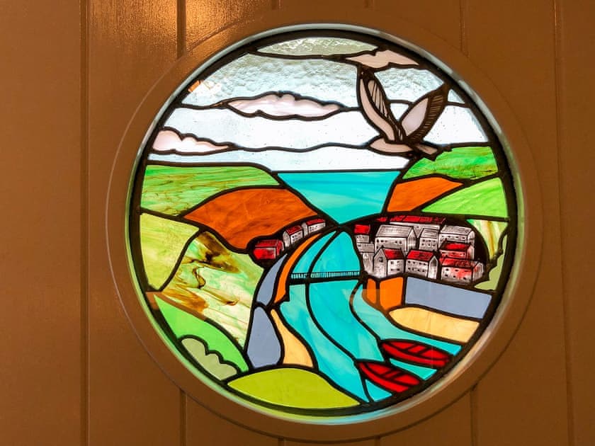 Feature, stained glass window in the kitchen door | The Anchorage, Staithes, near Whitby