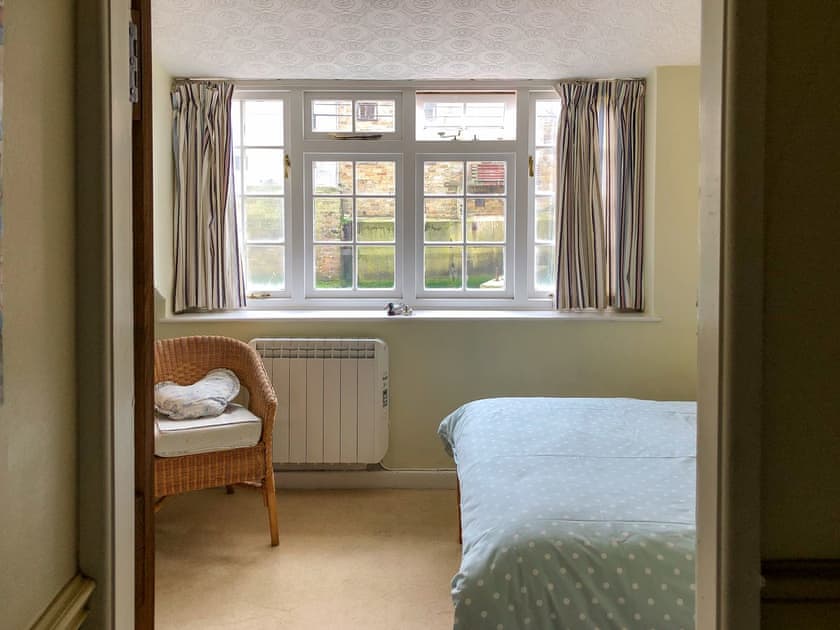 Cosy bedroom with double bed and an additional single | The Anchorage, Staithes, near Whitby