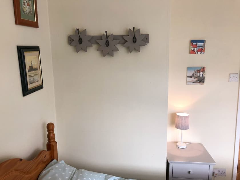 Cosy bedroom with double bed and an additional single | The Anchorage, Staithes, near Whitby