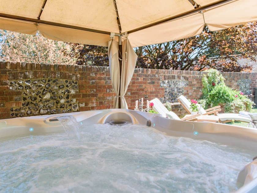 Luxuriate in the hot tub | The Manor Coach House, Chartham