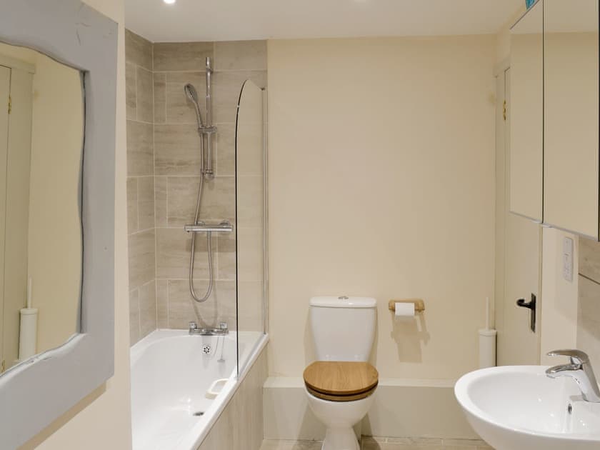 Family bathroom with shower over bath | Louisa’s Cottage, Priors Dean, near Petersfield