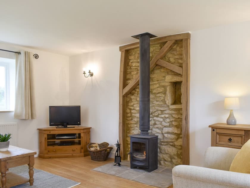Welcoming living room with wood burner | Cherry Cottage - Wood Dairy, North Perrott, near Crewkerne