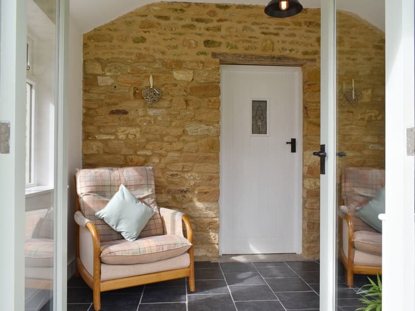 Additional seating within porch | Cherry Cottage - Wood Dairy, North Perrott, near Crewkerne