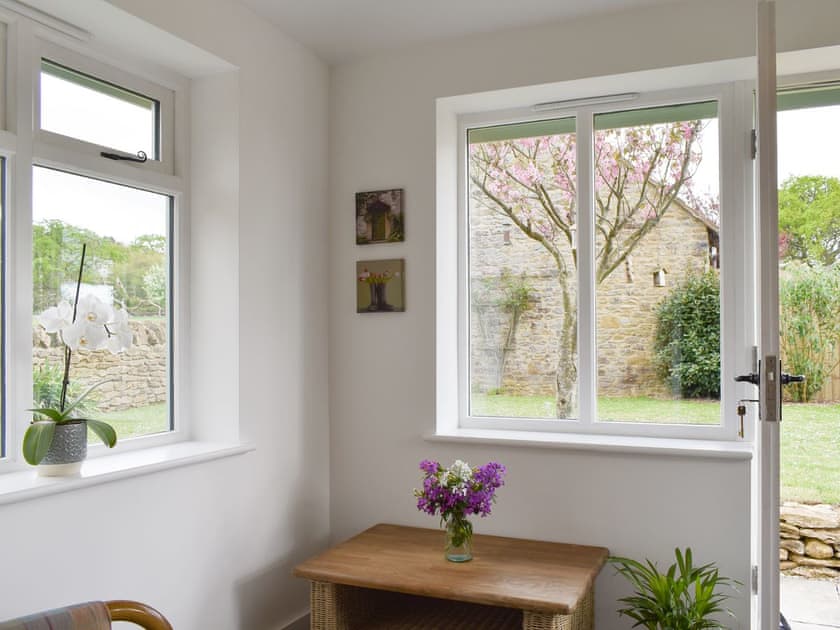 Light and airy porch with garden views | Cherry Cottage - Wood Dairy, North Perrott, near Crewkerne