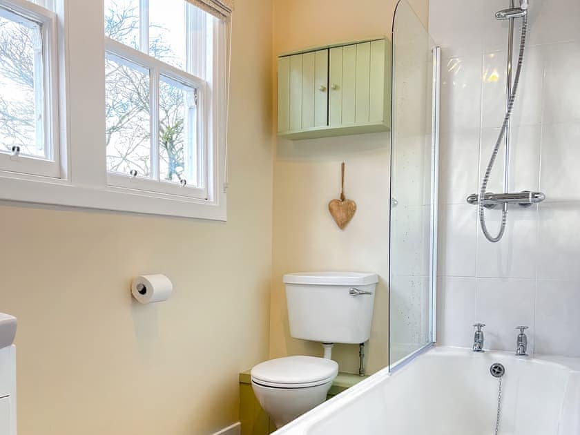 Bathroom with shower over bath | Strathisla Farm Cottages- Islabank Farmhouse - Strathisla Farm Cottages, Meigle