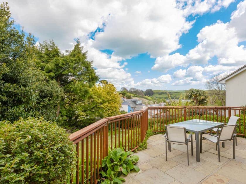 Rear Indian sandstone terraced patio area with outdoor furniture and BBQ | Rockvale 1, Salcombe