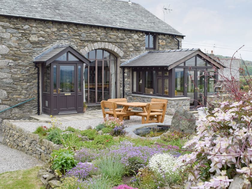 Beautiful holiday home and patio area | Hill Top Barn, Newton-in-Cartmel, near Grange-over-Sands