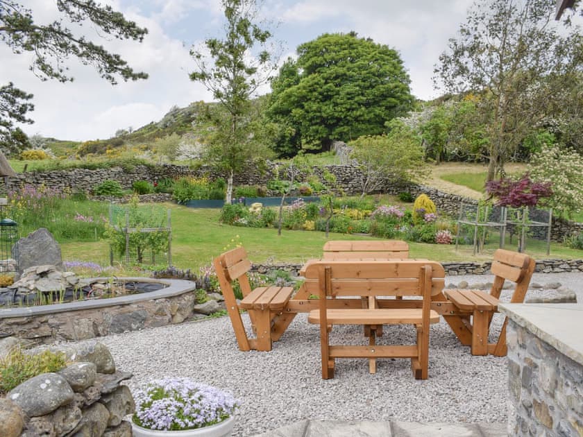 Gravelled patio with views over garden | Hill Top Barn, Newton-in-Cartmel, near Grange-over-Sands