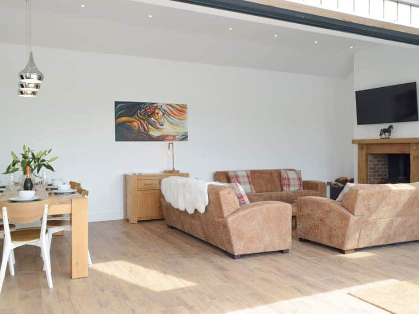 Bi-fold doors to attractive living areas | Manor Lodge Stables, Wiston, near Haverfordwest