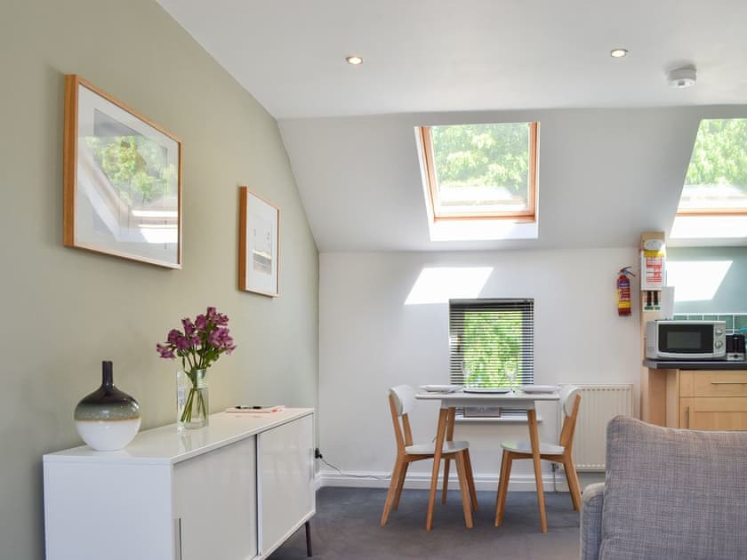 Modest dining area and adjacent kitchen | Biggan Mews - Oxtoby’s Cottages York, York