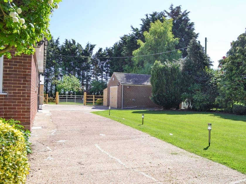 Patio area leading to garden | Wayside Cottage, North Frodingham, near Driffield