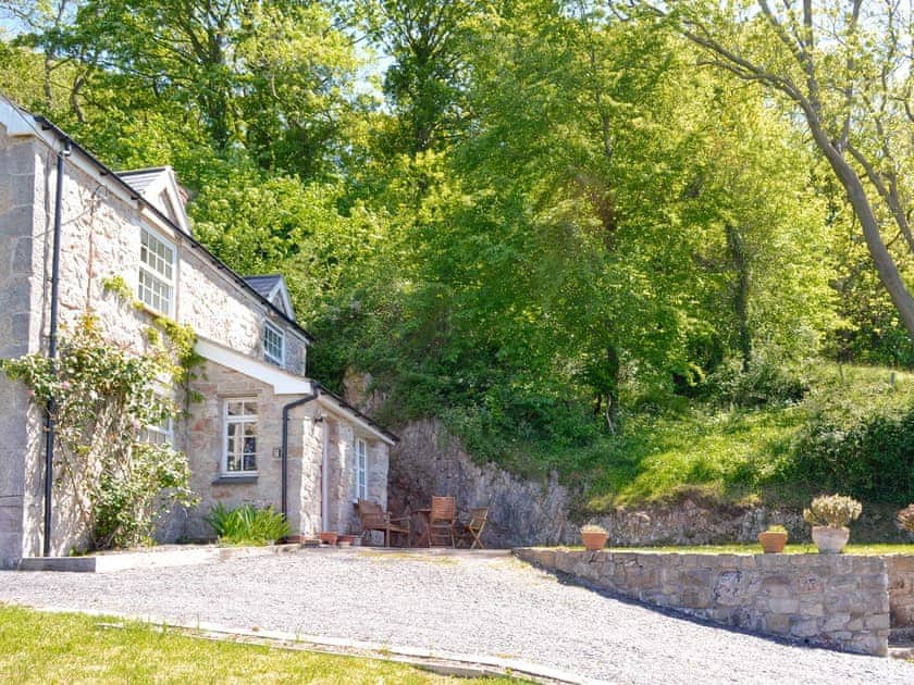 Lovely holiday home with outdoor furniture on the front patio | Ty Newydd y Graig, Tremeirchion, near St. Asaph