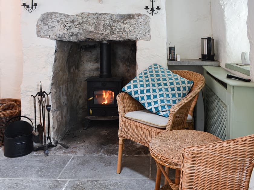Bothy sitting area with electric wood burner  | Tyn Lon, Moelfre, near Benllech
