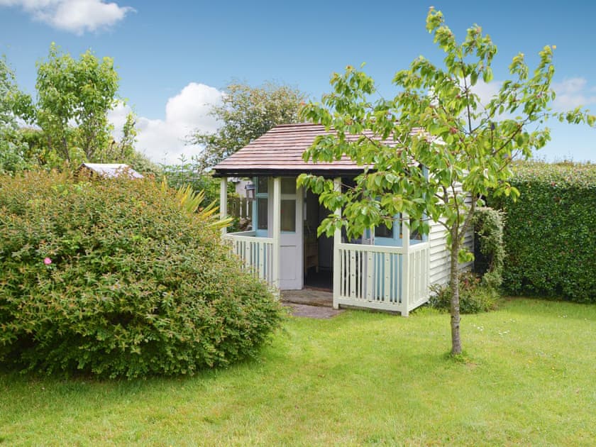 Enclosed garden with summerhouse | Tyn Lon, Moelfre, near Benllech