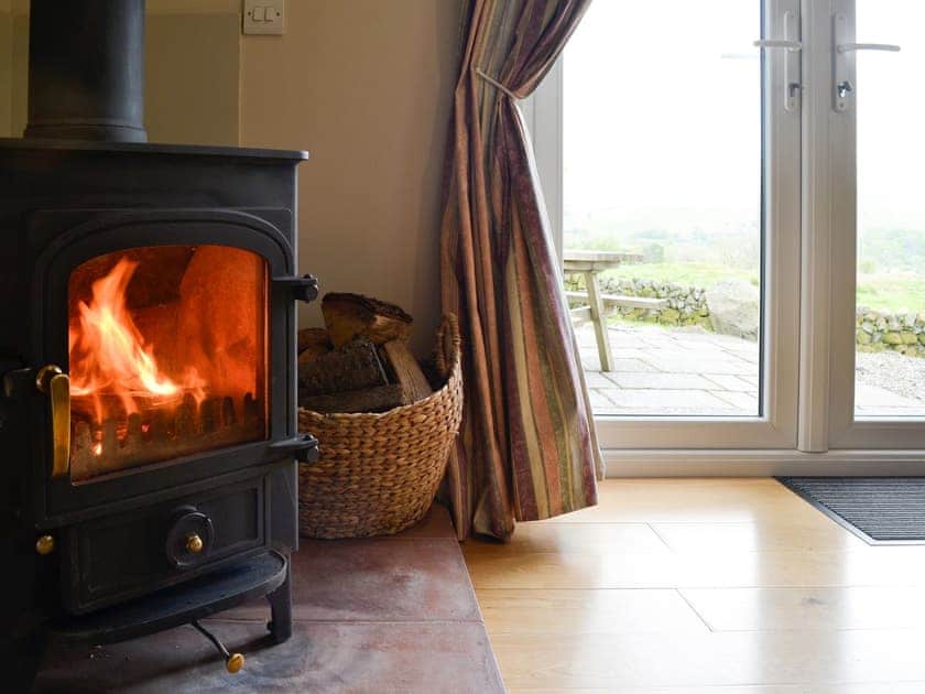Unwind by the cosy woodburner | Cleughbrae Cottage, Dalry, near Castle Douglas