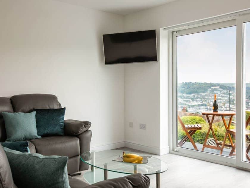 Living room with balcony access | Grandview Dartmouth, Dartmouth