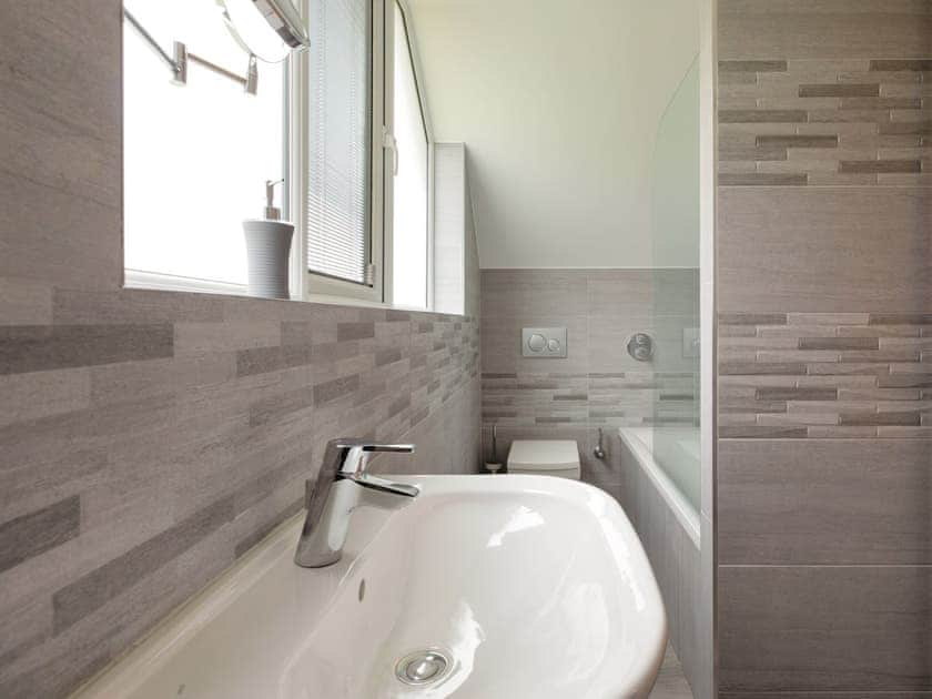 Bathroom with shower over bath | Grandview Dartmouth, Dartmouth