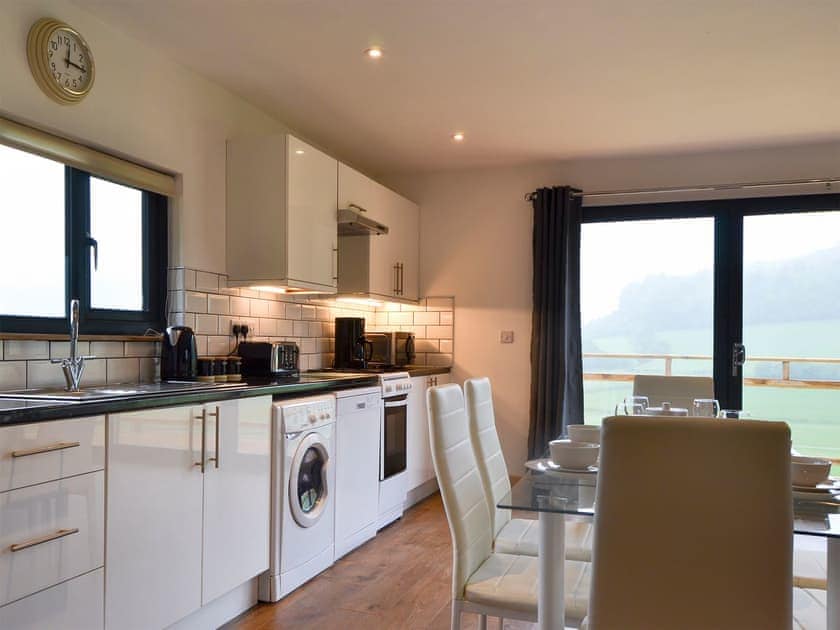 Kitchen and dining area | Offa’s Dyke Lodge - Acre Luxury Lodges, Stanner, near Kington